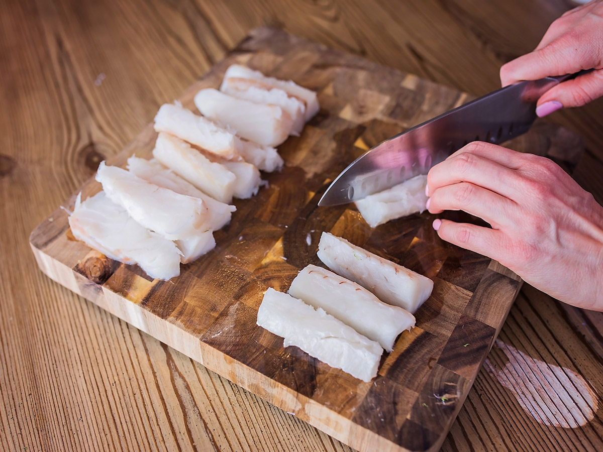 photo showing how to slice the fish for Homemade fish sticks recipe by Annessa Chumbley RD