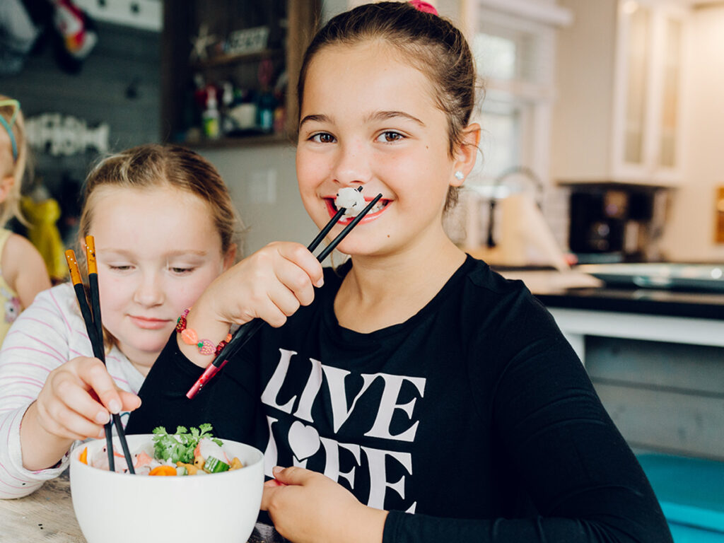 Children eating seafood