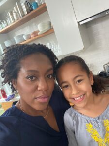 Maya Feller and her daughter Anaise cooking in the kitchen